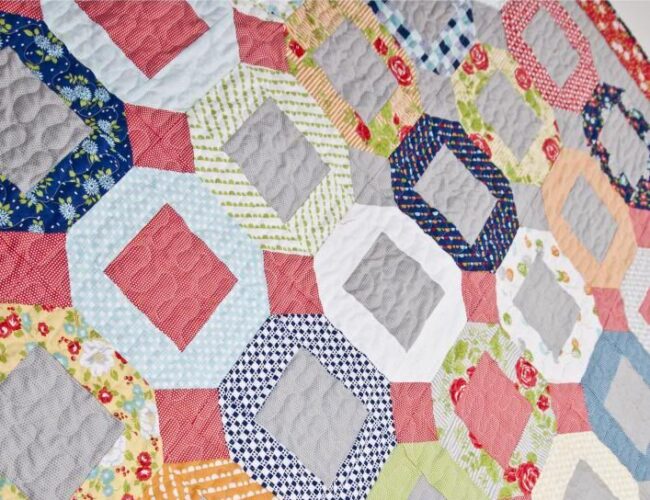 free pattern: Jumping Jacks jelly roll quilt tutorial by Lella Boutique. Fabric is Happy-Go-Lucky by Bonnie & Camille or Moda Fabrics.