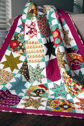 Starstruck sawtooth star quilt PDF pattern by Lella Boutique. Fabric is Avant-Garden by Momo for Moda fabrics. Layer Cake friendly.