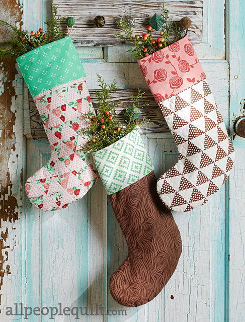 By the Chimney with Care stocking pattern by Lella Boutique. Digital pattern available in the December 2014 issue of American Patchwork & Quilting.