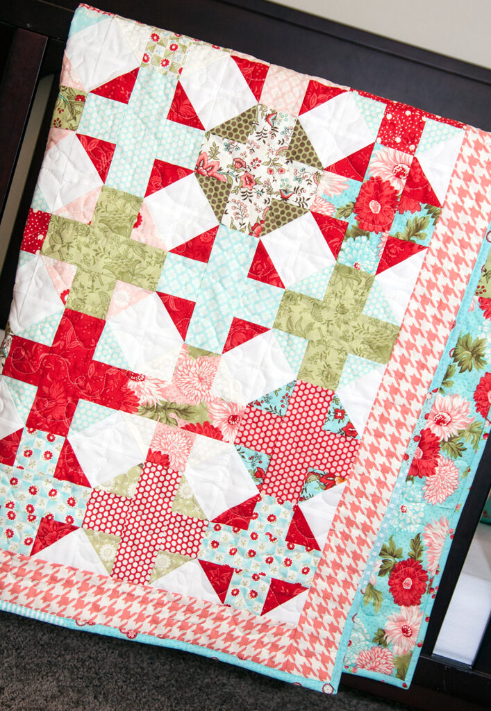 Hot Cross Buns baby quilt PDF pattern by Lella Boutique. Make it with a Jelly Roll or Layer Cake. Fabric is Bliss by Bonnie & Camille for Moda Fabrics.