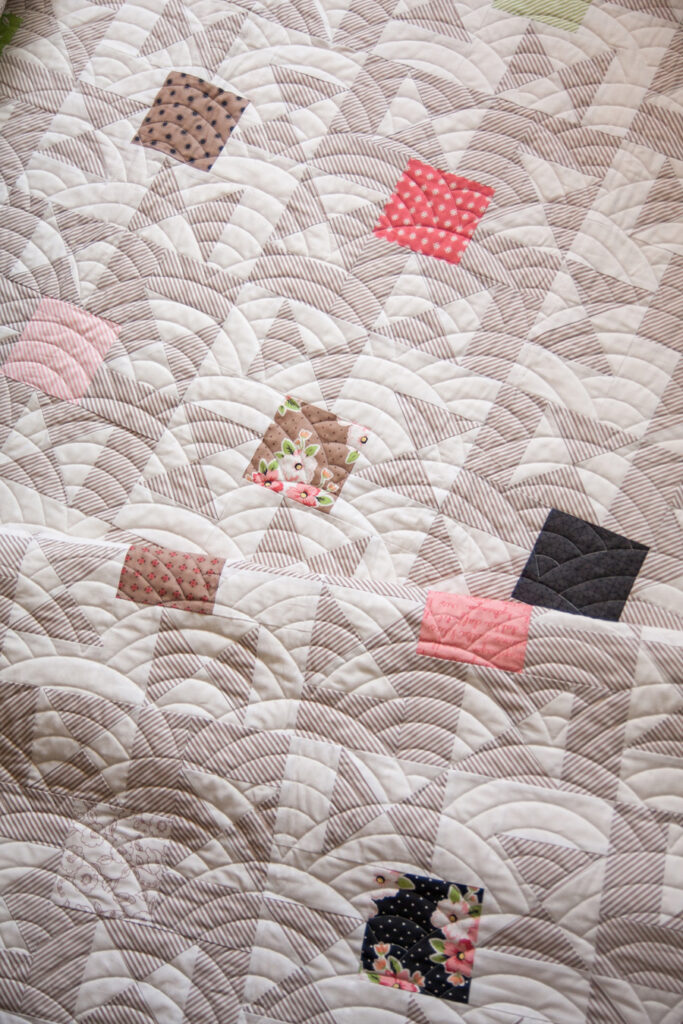 Candy Box charm pack quilt by Lella Boutique. Fabric is Olive's Flower Market by Lella Boutique for Moda Fabrics