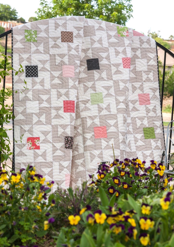 Candy Box charm pack quilt by Lella Boutique. Fabric is Olive's Flower Market by Lella Boutique for Moda Fabrics