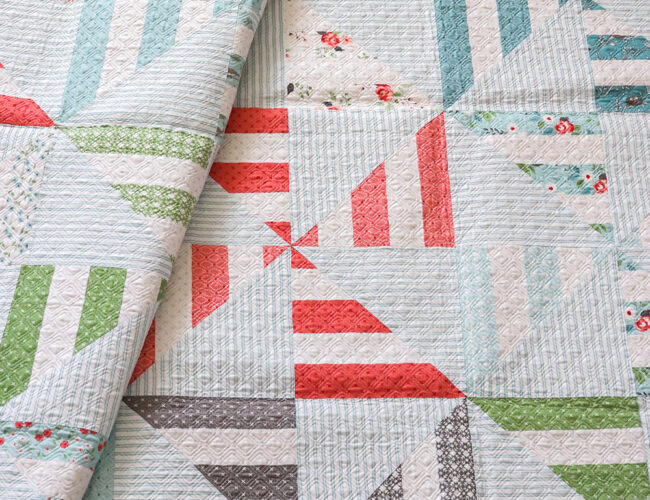 Parade quilt by Vanessa Goertzen of Lella Boutique. Pattern found in Jelly Filled - 18 Quilts from 2 1/2" Strips by Vanessa Goertzen of Lella Boutique. Fabric is Nest by Lella Boutique for Moda Fabrics.
