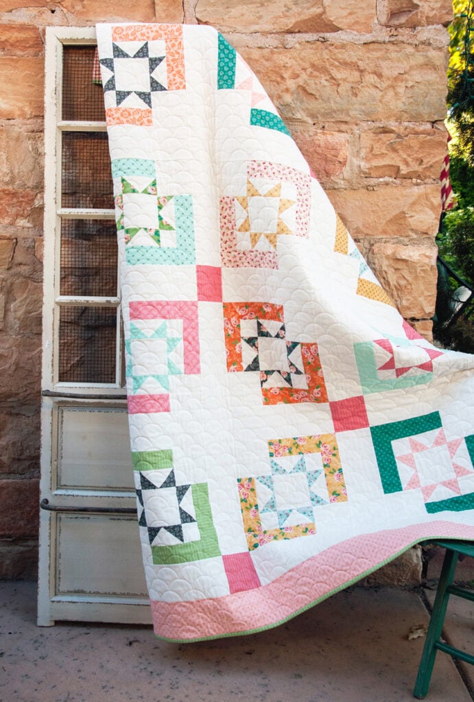 Star Crossed quilt by Lella Boutique. Make with with a Jelly Roll or Layer Cake. Fabric is Sugar Pie by Lella Boutique for Moda Fabrics