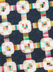 Hey Cupcake jelly roll quilt by Vanessa Goertzen of Lella Boutique. Fabric is Ombre Confetti by V & Co for Moda Fabrics