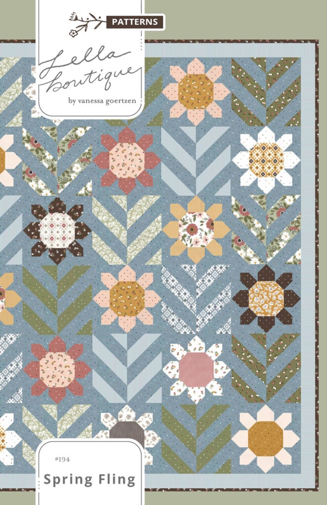 Spring Fling flower quilt PDf pattern by Lella Boutique. Make it with fat quarters, fat eighths, and half-yards. Fabric is Folktale by Lella Boutique for Moda Fabrics.