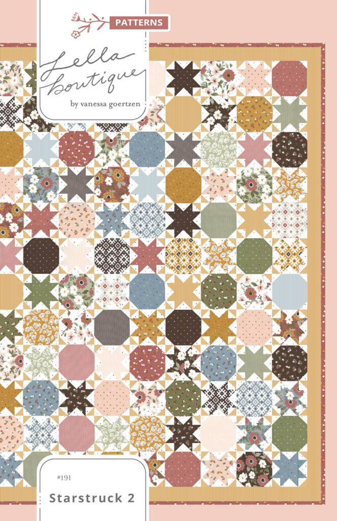 Starstruck 2 sawtooth star and snowball quilt by Lella Boutique. Make it with layer cakes or fat quarters. Fabric is Folktale by Lella Boutique for Moda