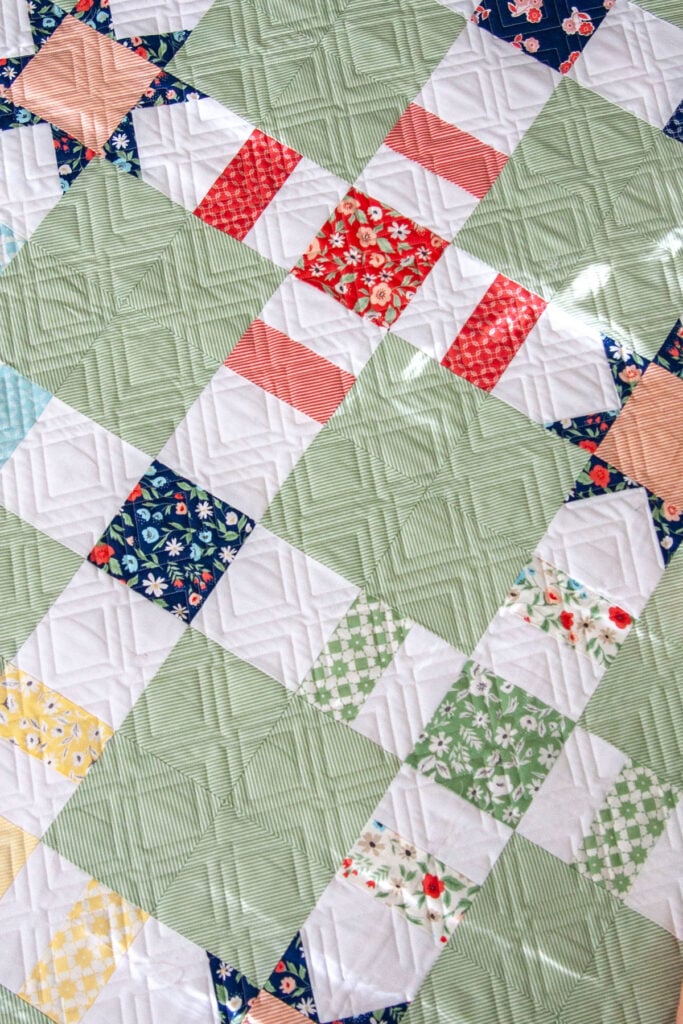 Pretty Please quilt by Lella Boutique. Make it with charm packs. Fabric is Garden Variety by Lella Boutique for Moda Fabrics