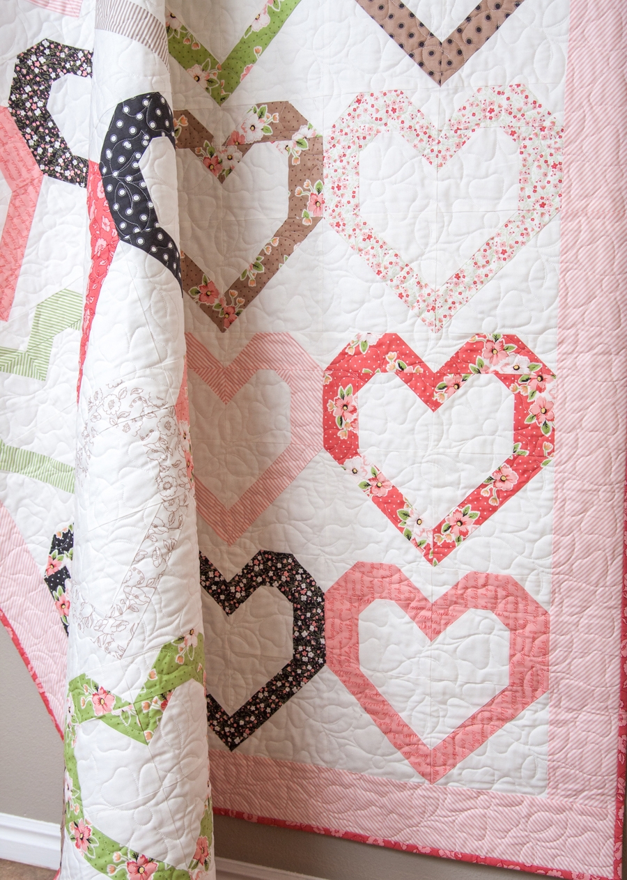 Open Heart quilt pattern by Lella Boutique. Make it with fat quarters or fat eighths. Fabric is Olive's Flower Market by Lella Boutique for Moda Fabrics.