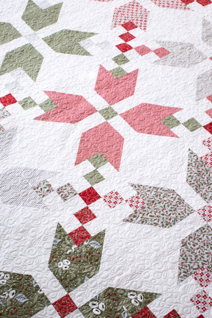 Figgy Pudding quilt by Vanessa Goertzen of Lella Boutique. Made with 9 fat quarters of Christmas Morning fabric by Lella Boutique for Moda Fabrics.