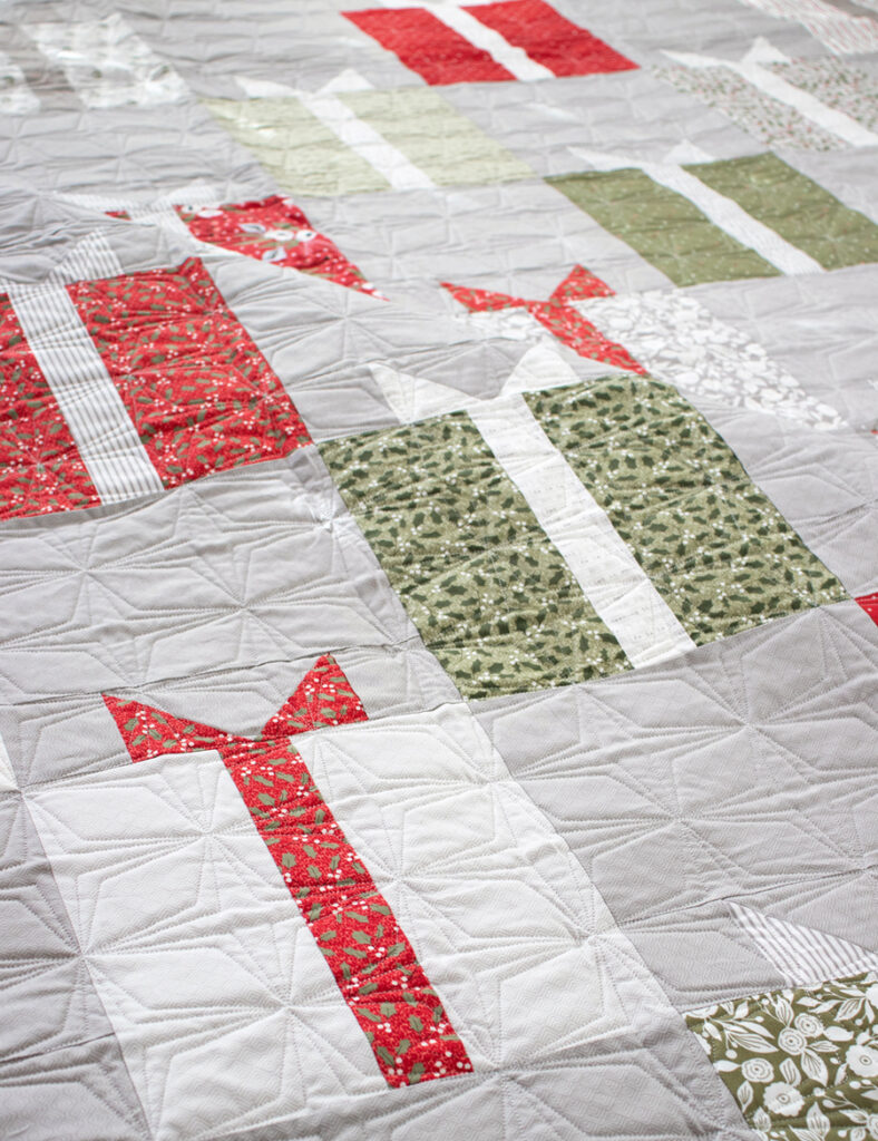 Nice List layer cake gift quilt by Lella Boutique. Fabric is Christmas Morning by Lella Boutique for Moda Fabrics.