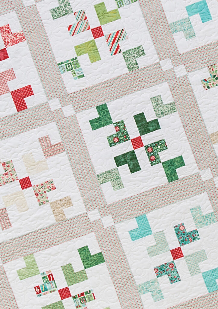 Snowfall snowflake quilt pattern by Lella Boutique. Fabric is Evergreen by BasicGrey for Moda Fabrics. Pattern found in Charm School - 18 Quilts from 5" Squares (Stash Books).