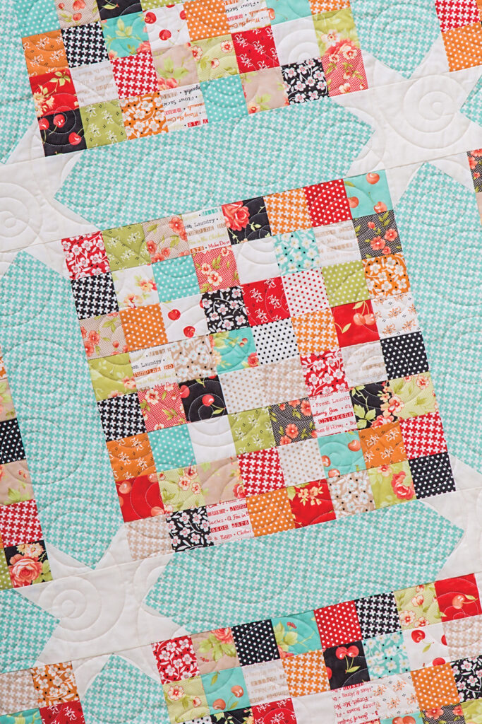 Scrap Happy scrappy quilt pattern by Lella Boutique. Fabric is Farmhouse by Joanna Figueroa of Fig Tree Quilts for Moda Fabrics. Pattern found in Charm School - 18 Quilts from 5" Squares (Stash Books).