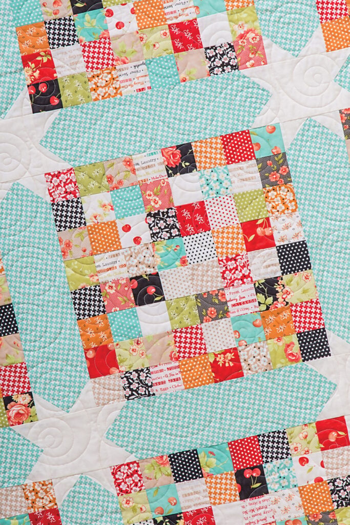 Scrap Happy scrappy quilt pattern by Lella Boutique. Fabric is Farmhouse by Joanna Figueroa of Fig Tree Quilts for Moda Fabrics. Pattern found in Charm School - 18 Quilts from 5" Squares (Stash Books).