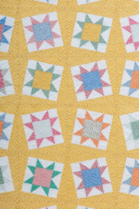 Tipsy quilt by Lella Boutique. Pattern found in the book: Charm School - 18 Quilts from 5" Squares. Fabric is from Aunt Grace collections by Marcus Fabrics