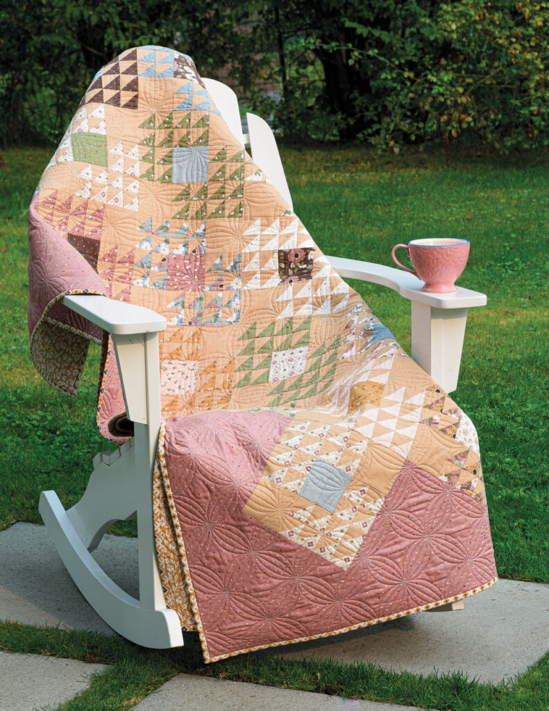 Moda All Stars: On a Roll Again. Sit a Spell jelly roll quilt pattern by Vanessa Goertzen of Lella Boutique |Moda All Stars by popular US quilting blog, Lella Boutique: image of a Sit a Spell jelly roll quilt. 