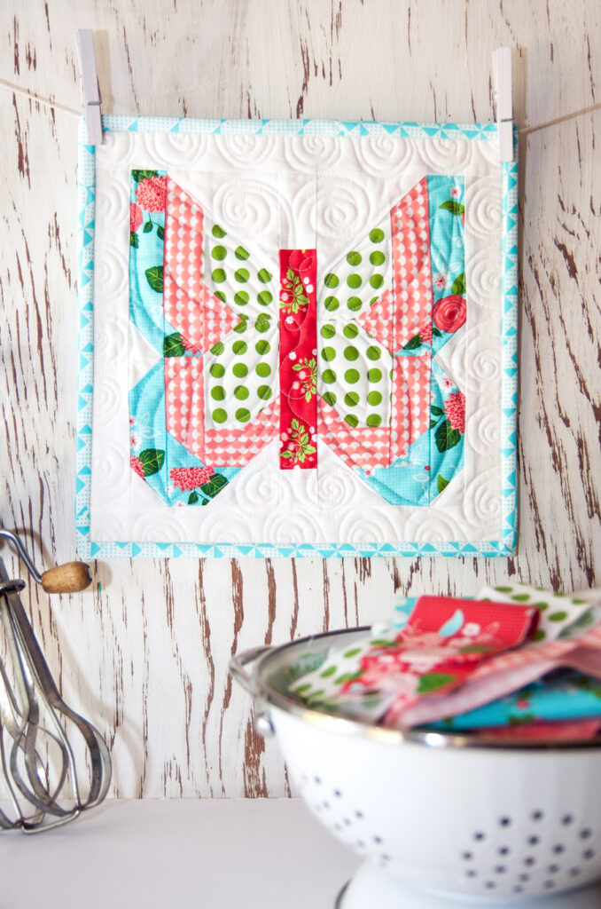 Social Butterfly mini quilt pattern by Vanessa Goertzen of Lella Boutique. fabric is Gooseberry by Lella Boutique for Moda Fabrics
