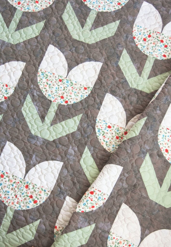 Holland tulip flower quilt PDF pattern by Lella Boutique. Great intro to curved piecing. Fabric is Garden Variety by Lella Boutique for Moda Fabrics