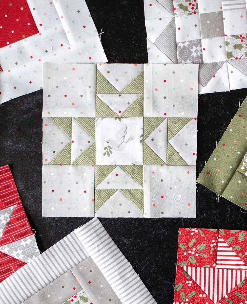 Sewcialites Quilt Along: Free Block of the Week by Fat Quarter Shop. Block 25 is "Virtue" by Bonnie Olaveson of Cotton Way. Fabric is Christmas Morning by Lella Boutique for Moda Fabrics.