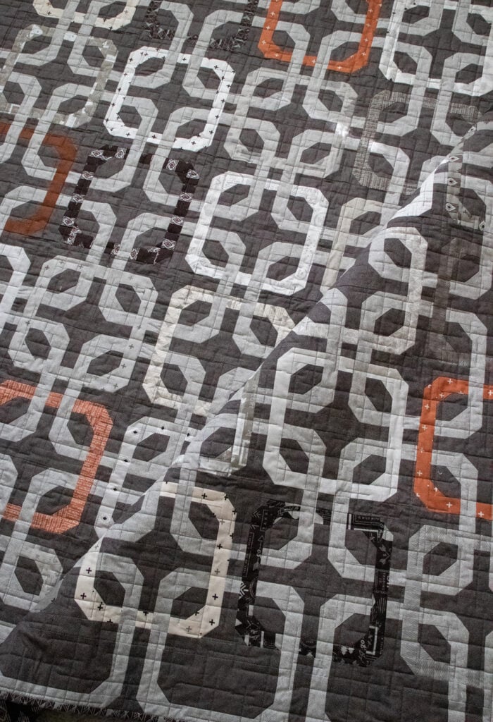 Concord modern overlapping rings quilt. Honeybun friendly quilt pattern. Fabric is Smoke & Rust by Lella Boutique for Moda Fabrics.