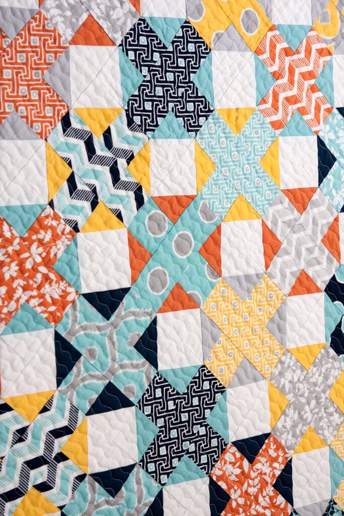 Hot Cross Buns plus sign quilt by Vanessa Goertzen of Lella Boutique. Fabric is Mixologie by Studio M for Moda Fabrics