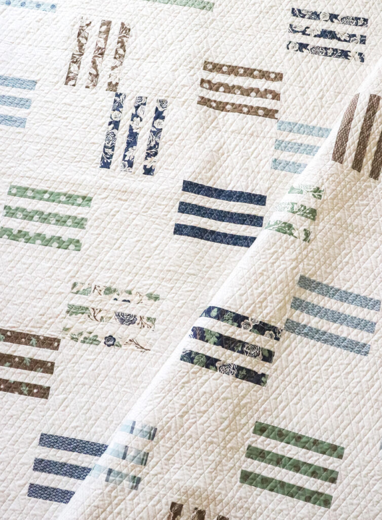 Rugby honeybun simple stripe quilt for boys by Vanessa Goertzen of Lella Boutique. Fabric is Harvest Road by Lella Boutique for Moda Fabrics