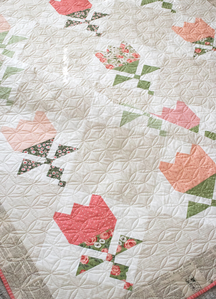 Tulip Shop flower quilt pattern by Vanessa Goertzen of Lella Boutique. Fabric is Love Note by Lella Boutique for Moda Fabrics.