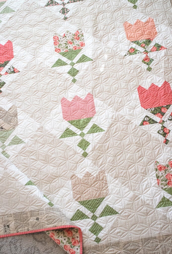 Tulip Shop flower quilt pattern by Vanessa Goertzen of Lella Boutique. Fabric is Love Note by Lella Boutique for Moda Fabrics.