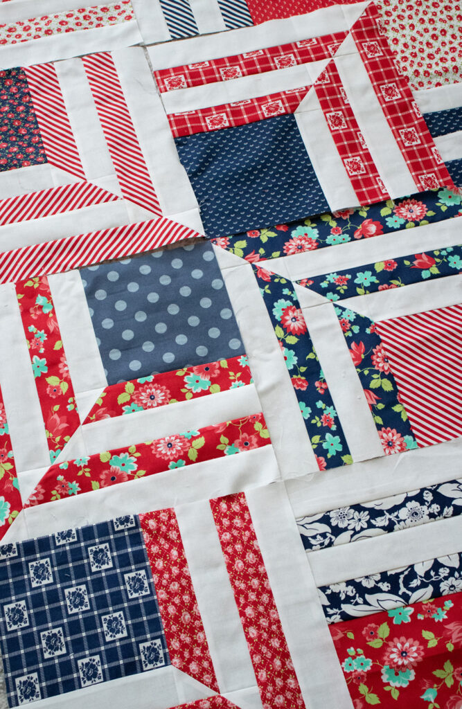 Fracture quilt block by Lella Boutique. It looks like an American flag quilt block in these blue + red Bonnie & Camille prints.