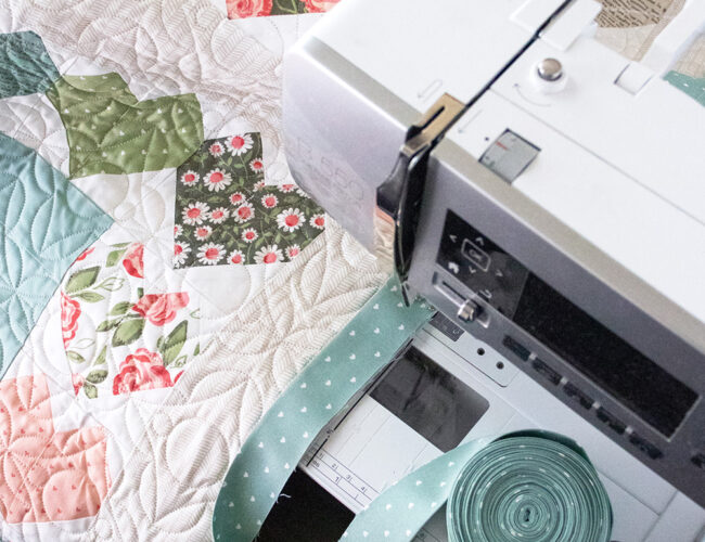 Lovey Dovey quilt pattern by Vanessa Goertzen of Lella Boutique. Fabric is Love Note by Lella Boutique for Moda Fabrics. Great machine binding tutorial for quilters
