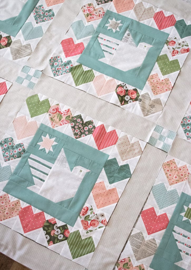 Lovey Dovey quilt by Vanessa Goertzen of Lella Boutique. Such a cute combo or pieced doves and hearts. Fabric is Love Note by Lella Boutique for Moda Fabrics.