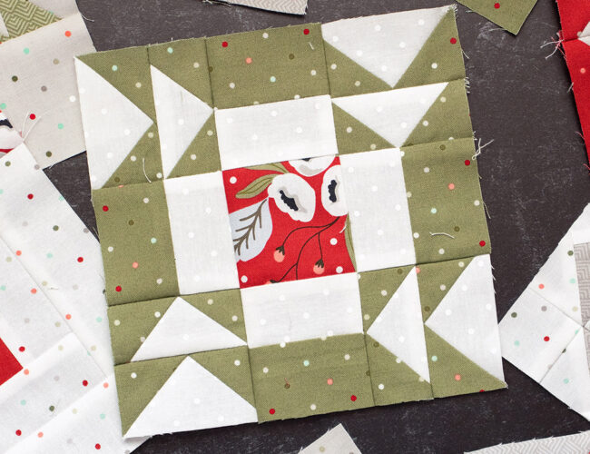 Sewcialites Quilt Along: Free Block of the Week. Block 13 is "Joy" by Susan Ache. Fabric is Christmas Morning by Lella Boutique.