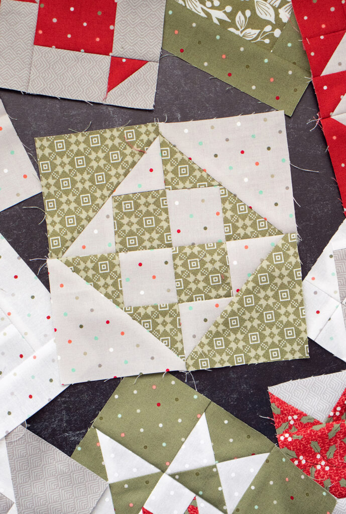 Sewcialites Quilt Along: Free Block of the Week. Block 7 is "Kindred" by Bonnie Olaveson of Cotton Way. Fabric is Christmas Morning by Lella Boutique.