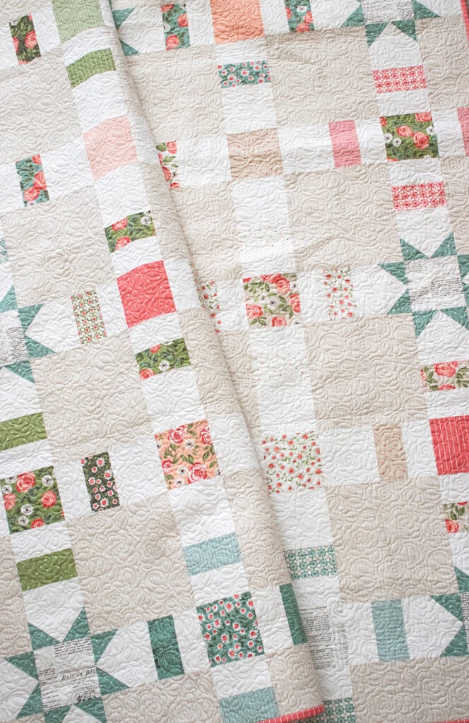 Pretty Please charm pack quilt by Lella Boutique. Beautiful and simple with a few sawtooth stars throughout. Fabric is Love Note by Lella Boutique for Moda Fabrics.