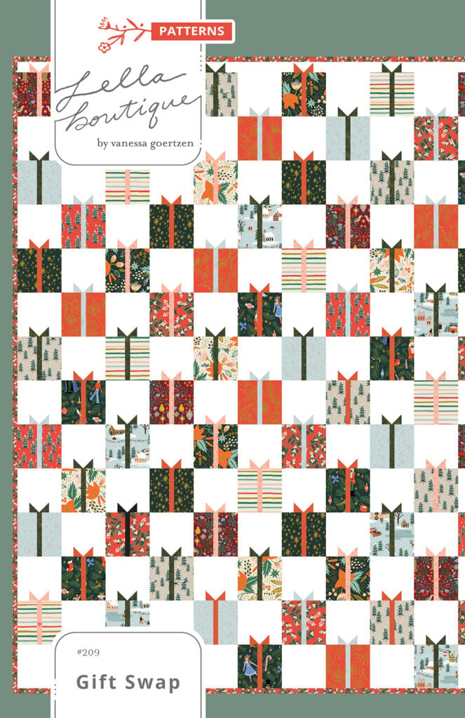 Gift Swap Christmas present quilt by Lella Boutique. Fabric is Holiday Classics by RIfle Paper Co for Cotton + Steel. Make it with charm packs, layer cakes, or fat quarters!