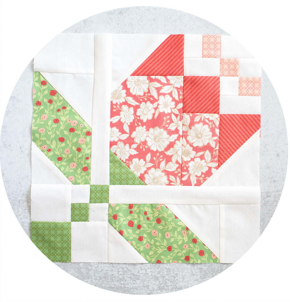 2020 Mystery Designer Block of the Month. Block 1 is May Day by Vanessa Goertzen of Lella Boutique. Flower quilt blocks made in Bloomington fabric by Lella Boutique for Moda Fabrics.