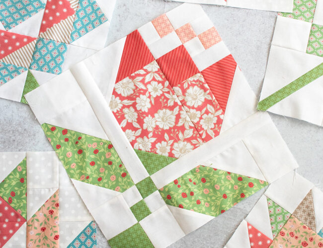 2020 Mystery Designer Block of the Month quilt by Fat Quarter Shop. Flower quilt blocks made in Bloomington fabric by Lella Boutique for Moda Fabrics.