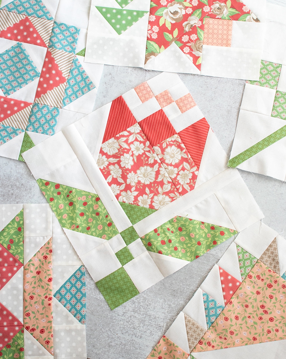 2020 Mystery Designer Block of the Month quilt by Fat Quarter Shop. Flower quilt blocks made in Bloomington fabric by Lella Boutique for Moda Fabrics.