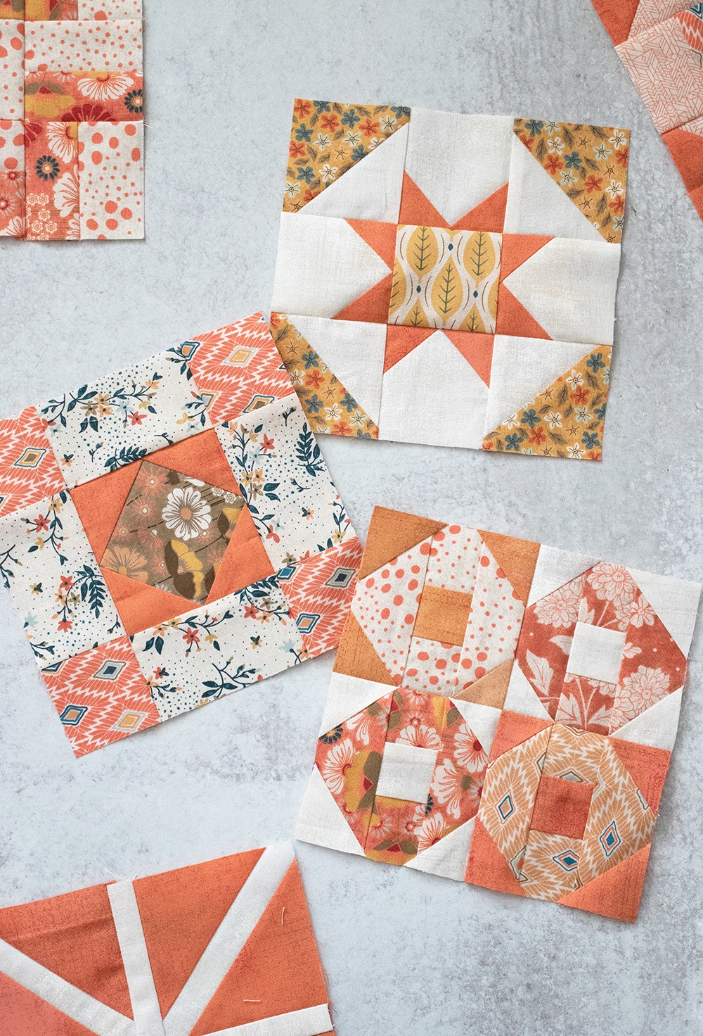 Sampler Spree Sew Along (Week 4). Check out Vanessa's blocks using Cider and Persimmon fabric by BasicGrey + her fall leaf quilt top layout.