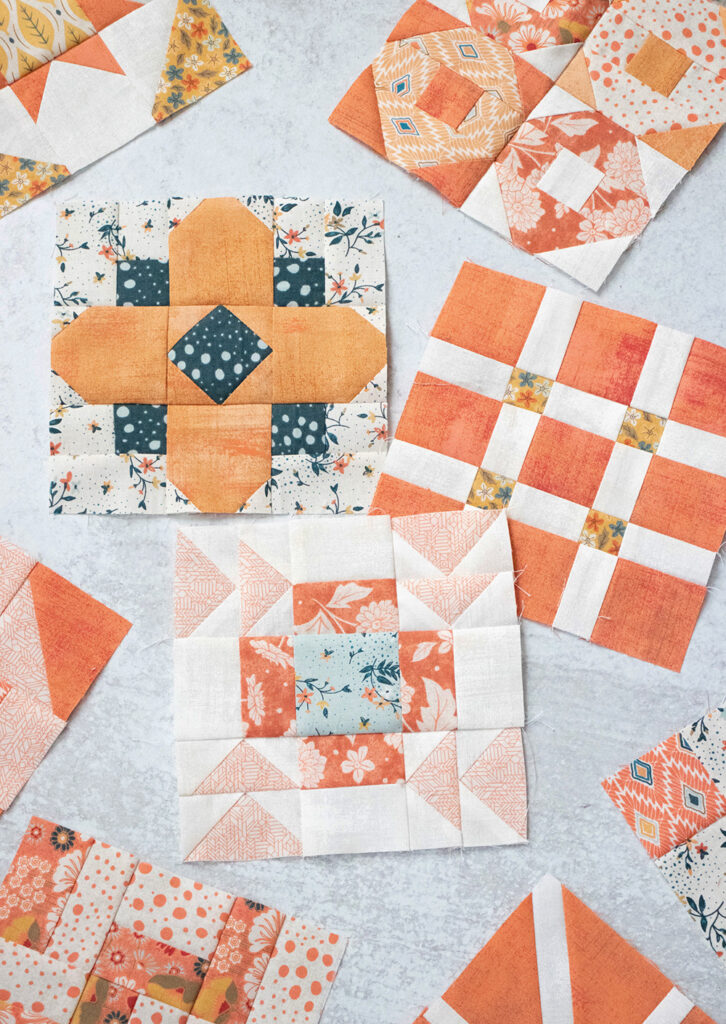 Sampler Spree Sew Along (Week 5). Check out Vanessa's blocks using Cider and Persimmon fabric by BasicGrey + her fall leaf quilt top layout.