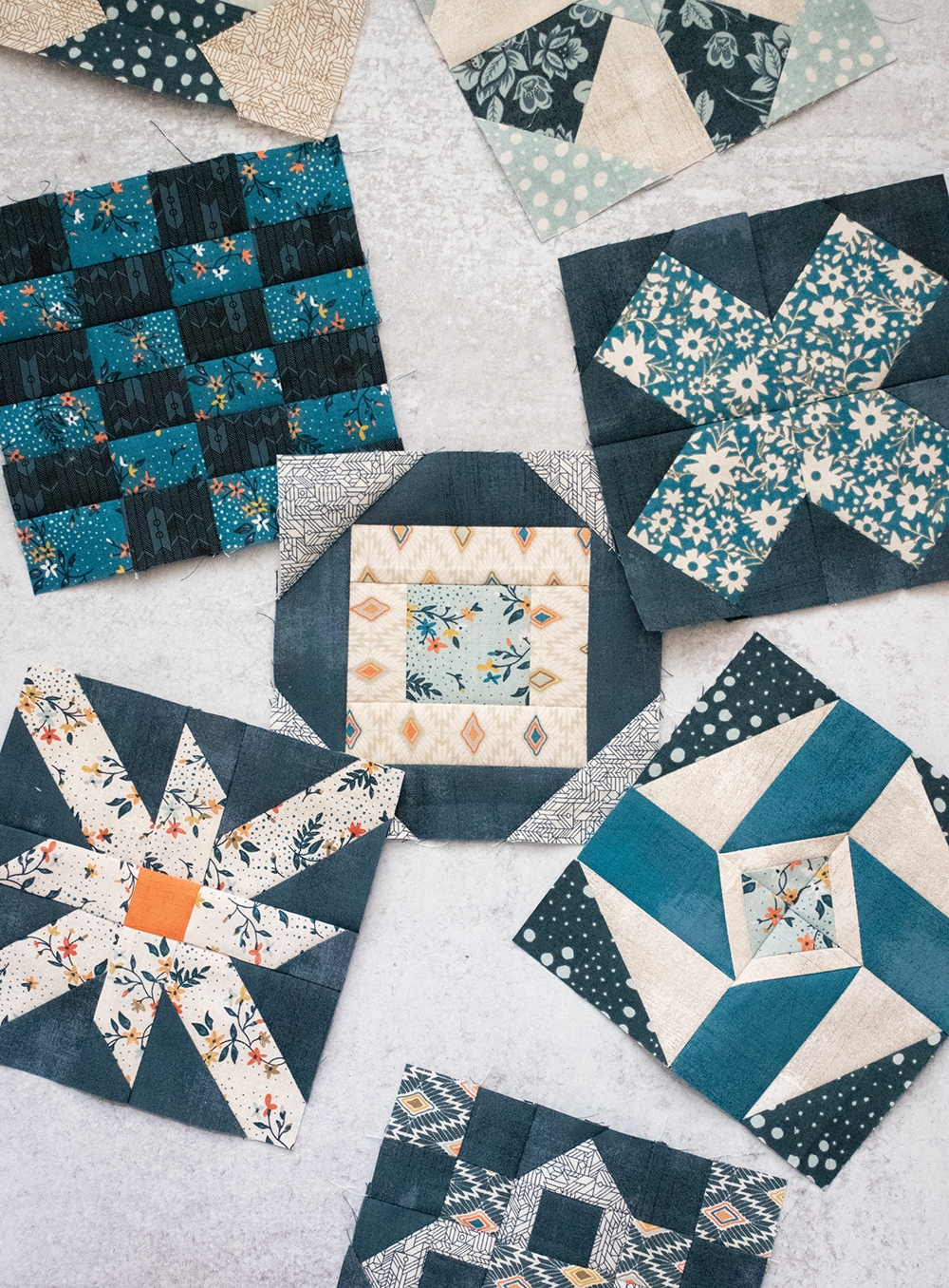 Sampler Spree Sew Along (Week 2). Check out Vanessa's blocks using Cider and Persimmon fabric by BasicGrey + her fall leaf quilt top layout.