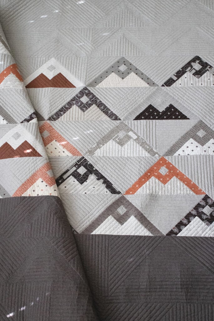 Mountainside quilt by Lella Boutique. Fabric is Smoke & Rust by Lella Boutique for Moda Fabrics. Make it with fat eighths. Great boy or modern quilt. Fabric is Smoke & Rust by Lella Boutique for Moda Fabrics