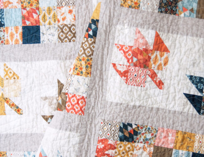 Leaves of Change quilt by Vanessa Goertzen of Lella Boutique. Fabric is Persimmon by BasicGrey for Moda Fabrics. Make it with 1 Jelly Roll.