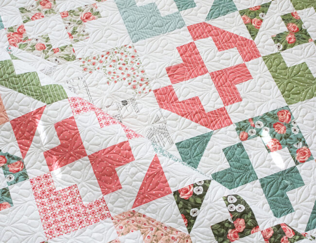 June Bug Layer Cake quilt by Vanessa Goertzen of Lella Boutique. Fabric is Love Note by Lella Boutique for Moda Fabrics.