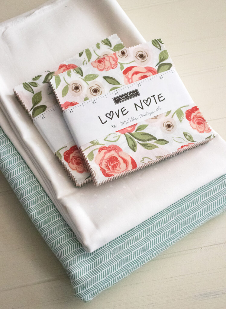 Shuffle charm pack quilt. Really cute pinwheel quilt in Love Note fabric by Lella Boutique for Moda Fabrics.