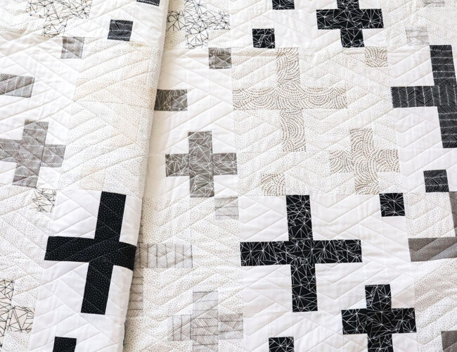 Sprinkles on Top jelly roll quilt. Really cool, graphic black and white plus sign quilt. Pattern is found in the book: Jelly Filled - 18 Quilts from 2-1/2" Strips by Vanessa Goertzen of Lella Boutique. Fabric is Catnip by Gingiber for Moda Fabrics.