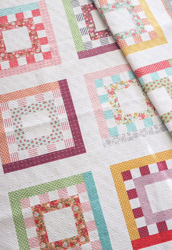 Square Dance jelly roll quilt PDF pattern by Lella Boutique. Fabric is Lollipop Garden by Lella Boutique for Moda Fabrics