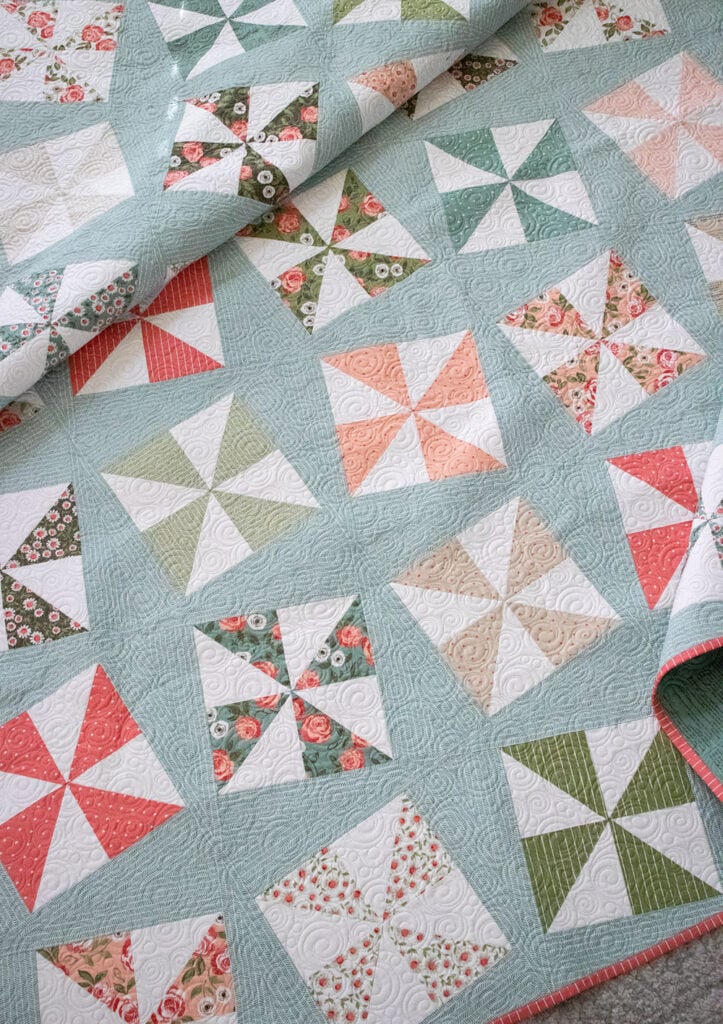 Shuffle charm pack quilt. Really cute pinwheel quilt in Love Note fabric by Lella Boutique for Moda Fabrics.