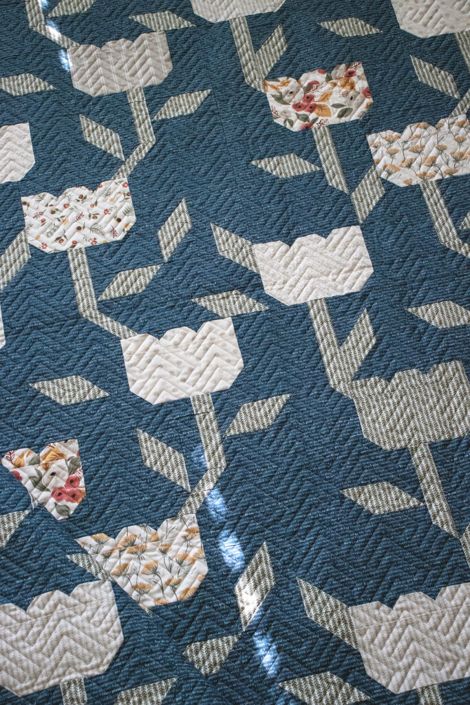 Flourish climbing flower quilt pattern by Vanessa Goertzen of Lella Boutique. Fabric is Flower Pot by Lella Boutique for Moda Fabrics.
