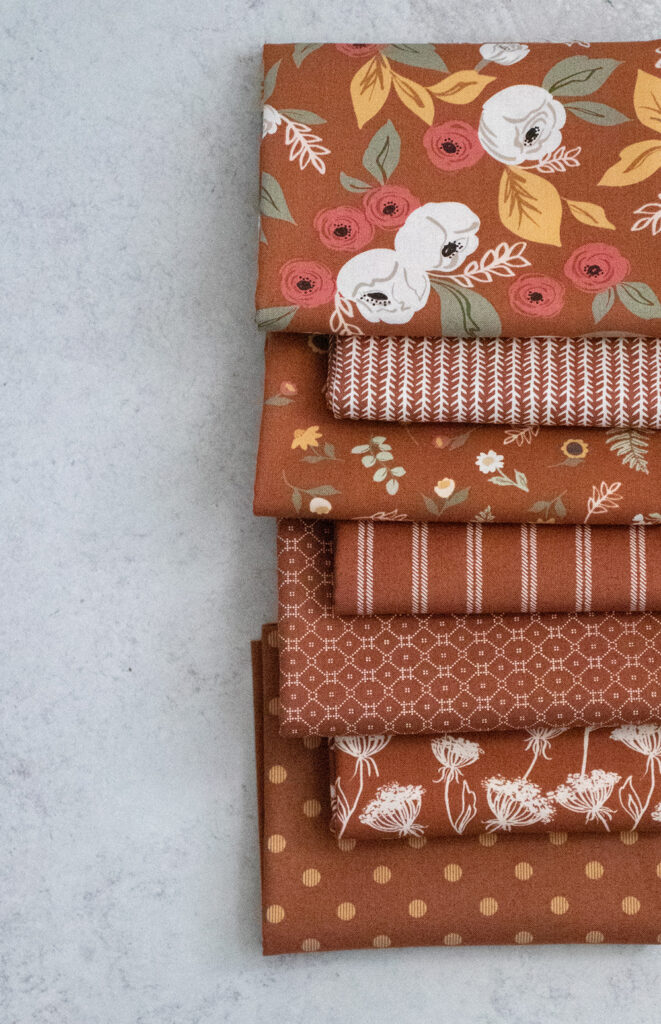 The clay colorway of Matching solids of Flower Pot fabric by Lella Boutique for Moda Fabrics.